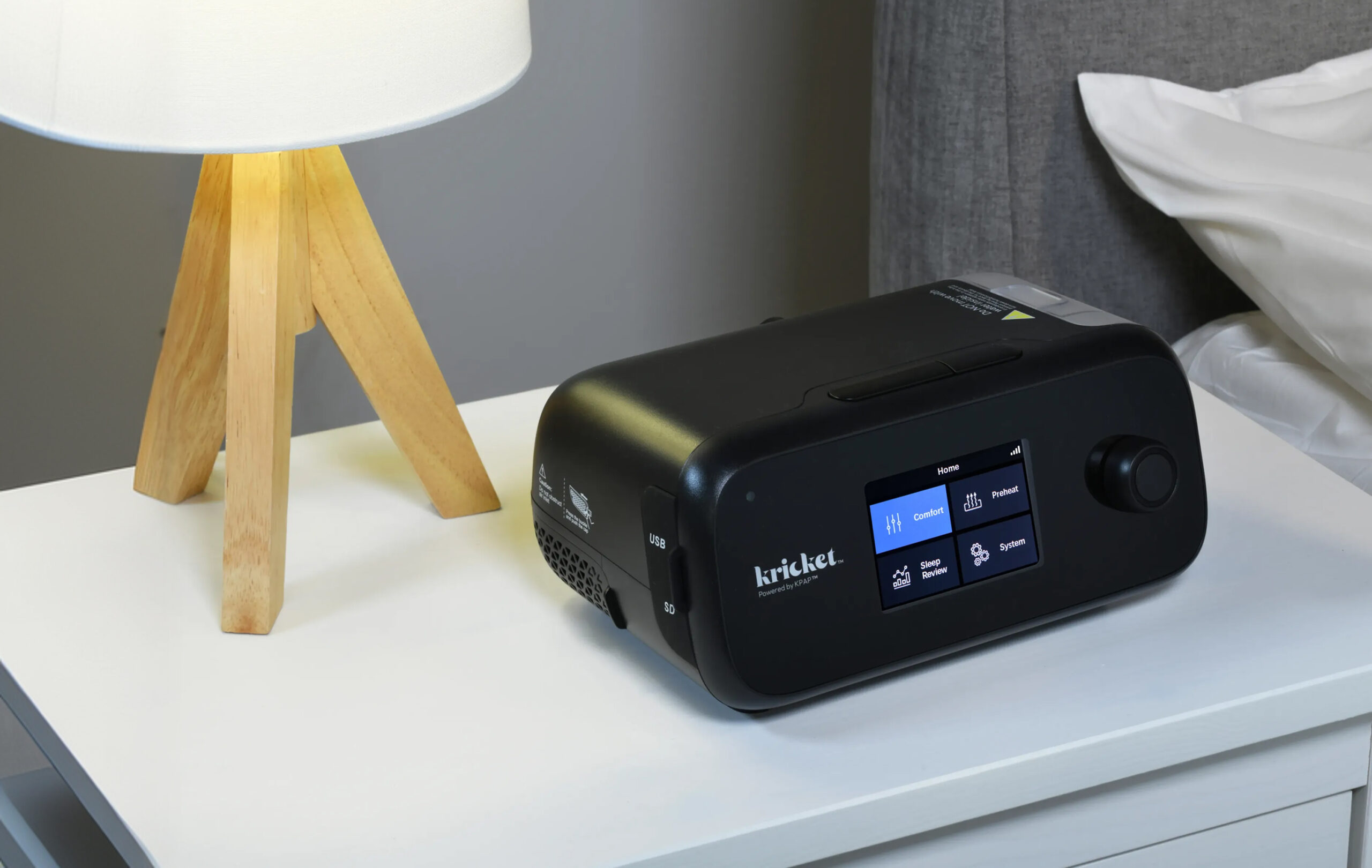 Kricket KPAP sleep apnea device fitting comfortably on a nightstand